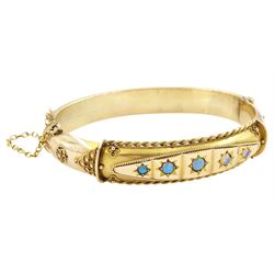 Victorian 9ct gold opal Etruscan design bangle, five round cut opals star set within a can...